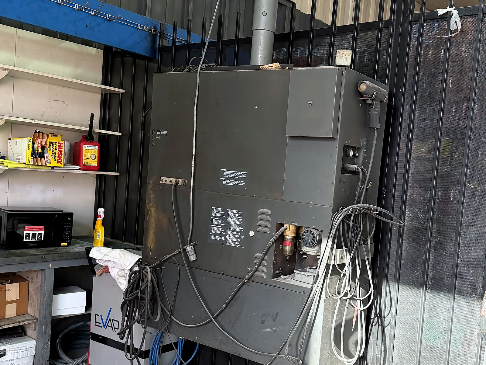 Out-of-state vehicle smog check in Los Angeles, CA: emissions analyzer and equipment inside our station