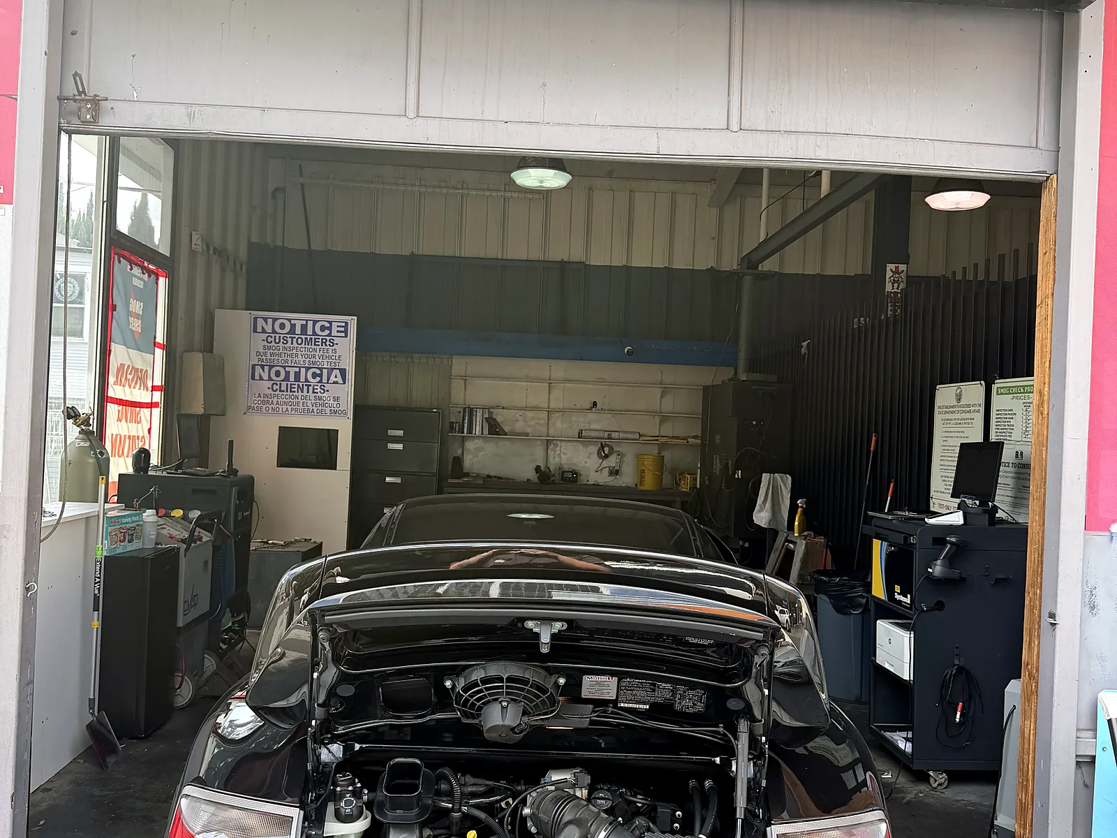 STAR smog check in Los Angeles, CA: Porsche 911 with the engine lid open in our test lane