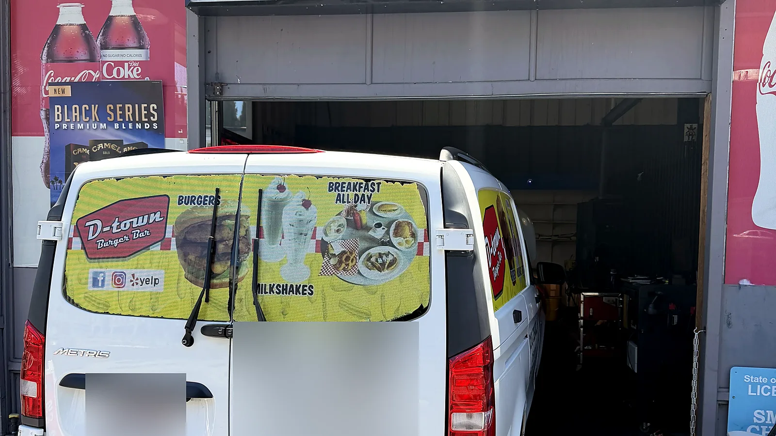 Vehicles we service in Los Angeles, CA: a commercial van pulled into our Olympic Blvd station